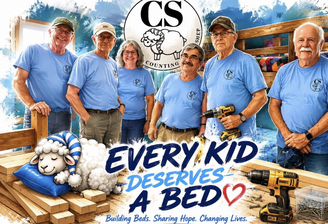 Counting Sheep volunteers in blue shirts standing with a newly built bed. Every kid deserves a bed. Building beds. Sharing hope. Changing lives.